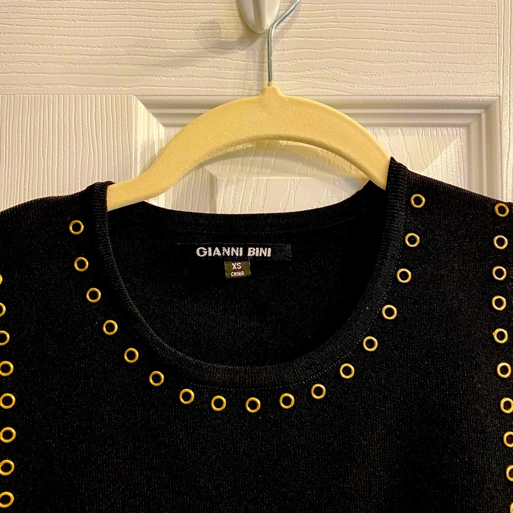 Adorable  Gianni Bini black dress. Bright gold Grommet accents  size XS